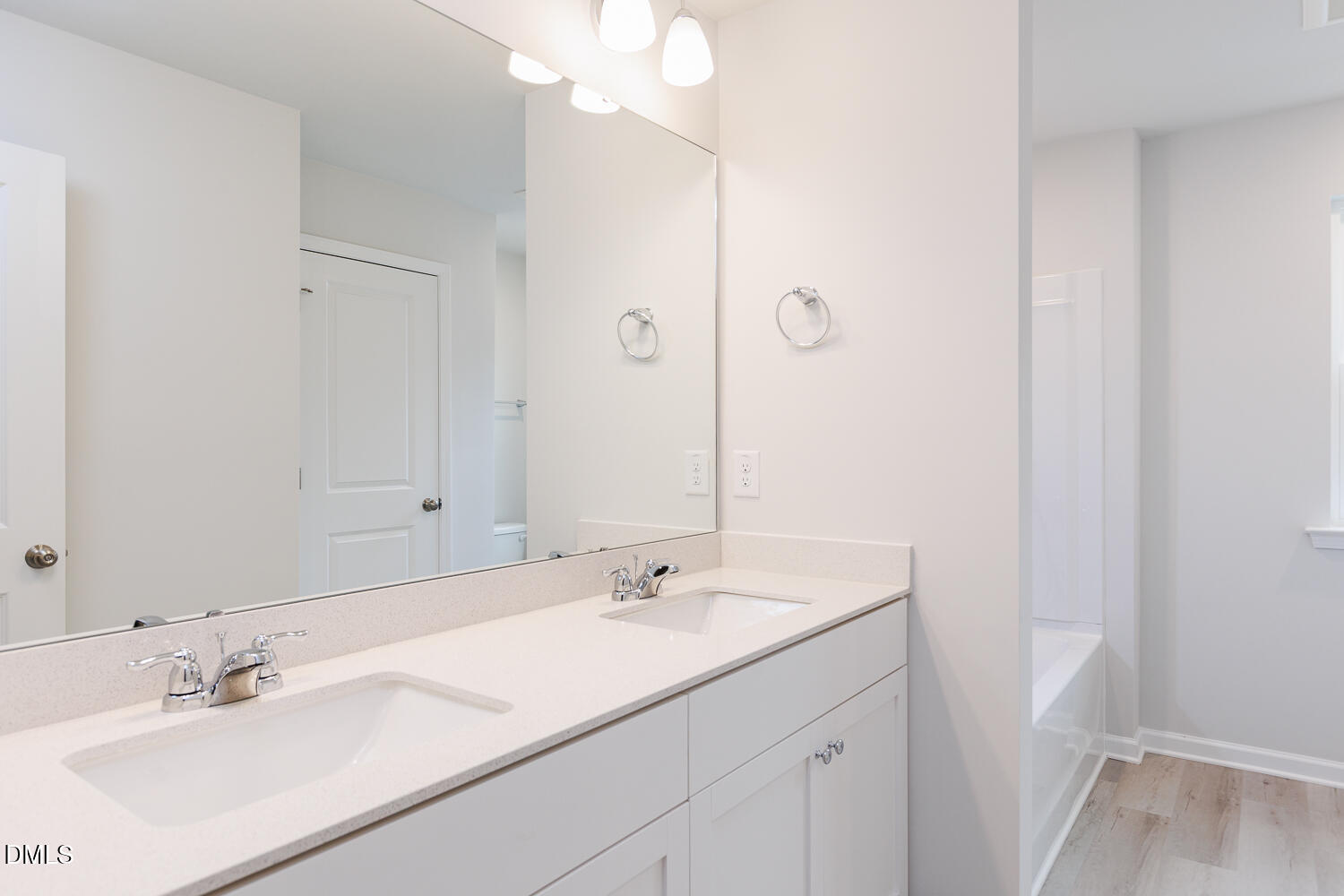 144 Siebold Street Garner, NC 27529 - Photo 34 of 40 a bathroom with a sink vanity and a mirror