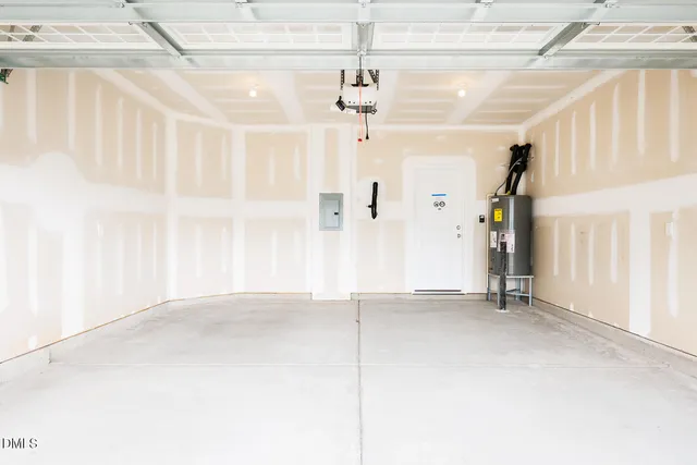 a bathroom with a sink a mirror a vanity and a shower