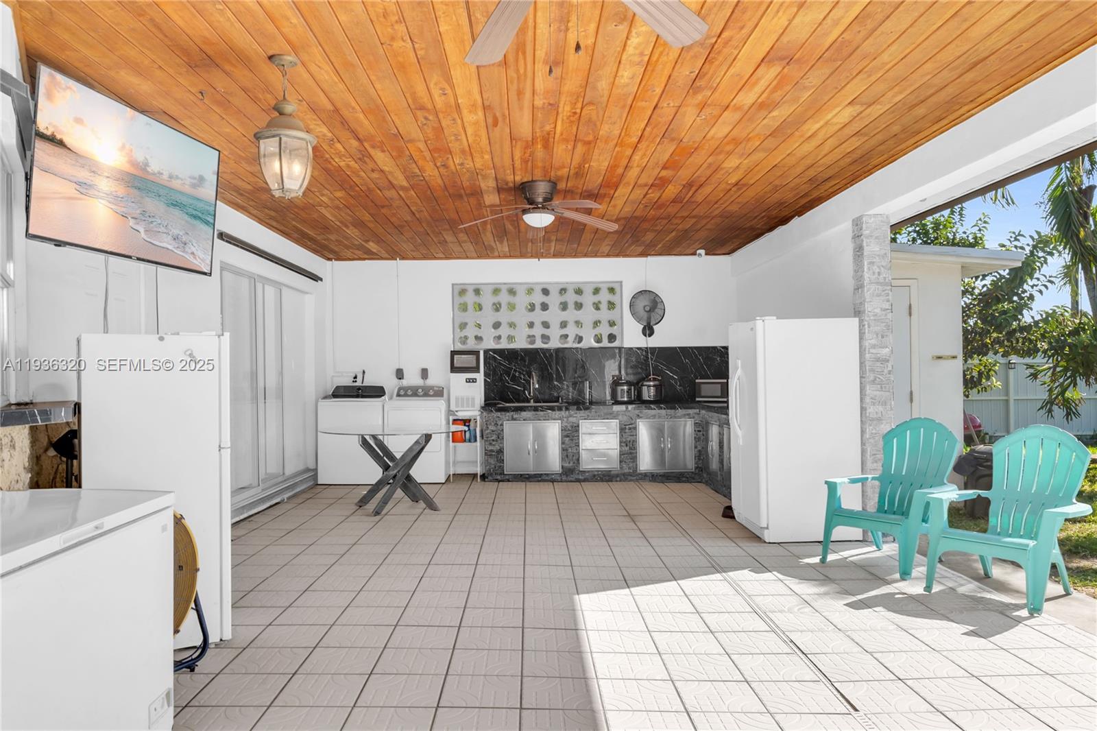 610 Northwest 16th Street Homestead, FL 33030 - Photo 14 of 27 a living room with furniture and a fireplace