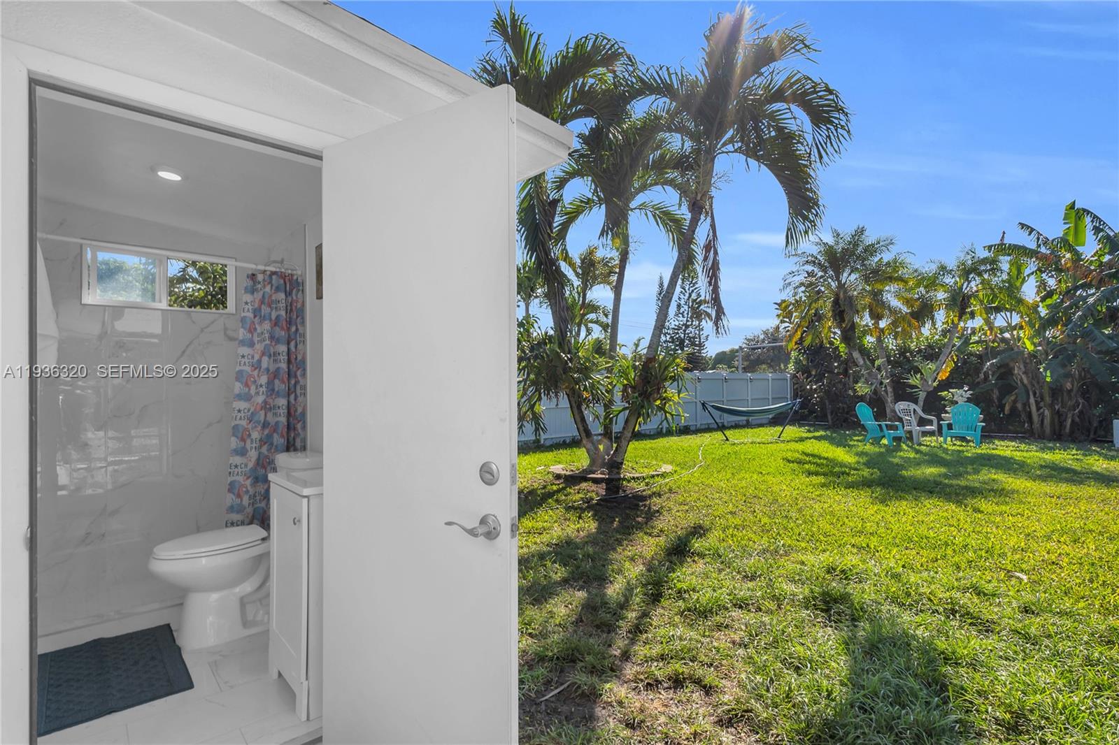 610 Northwest 16th Street Homestead, FL 33030 - Photo 20 of 27 a bathroom with a toilet and a shower