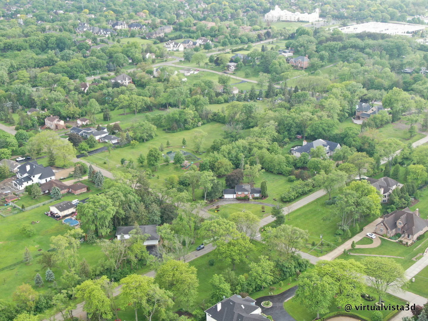 200 77th Street Burr Ridge, IL 60527 - Photo 31 of 33 a view of a lush green forest with lots of trees