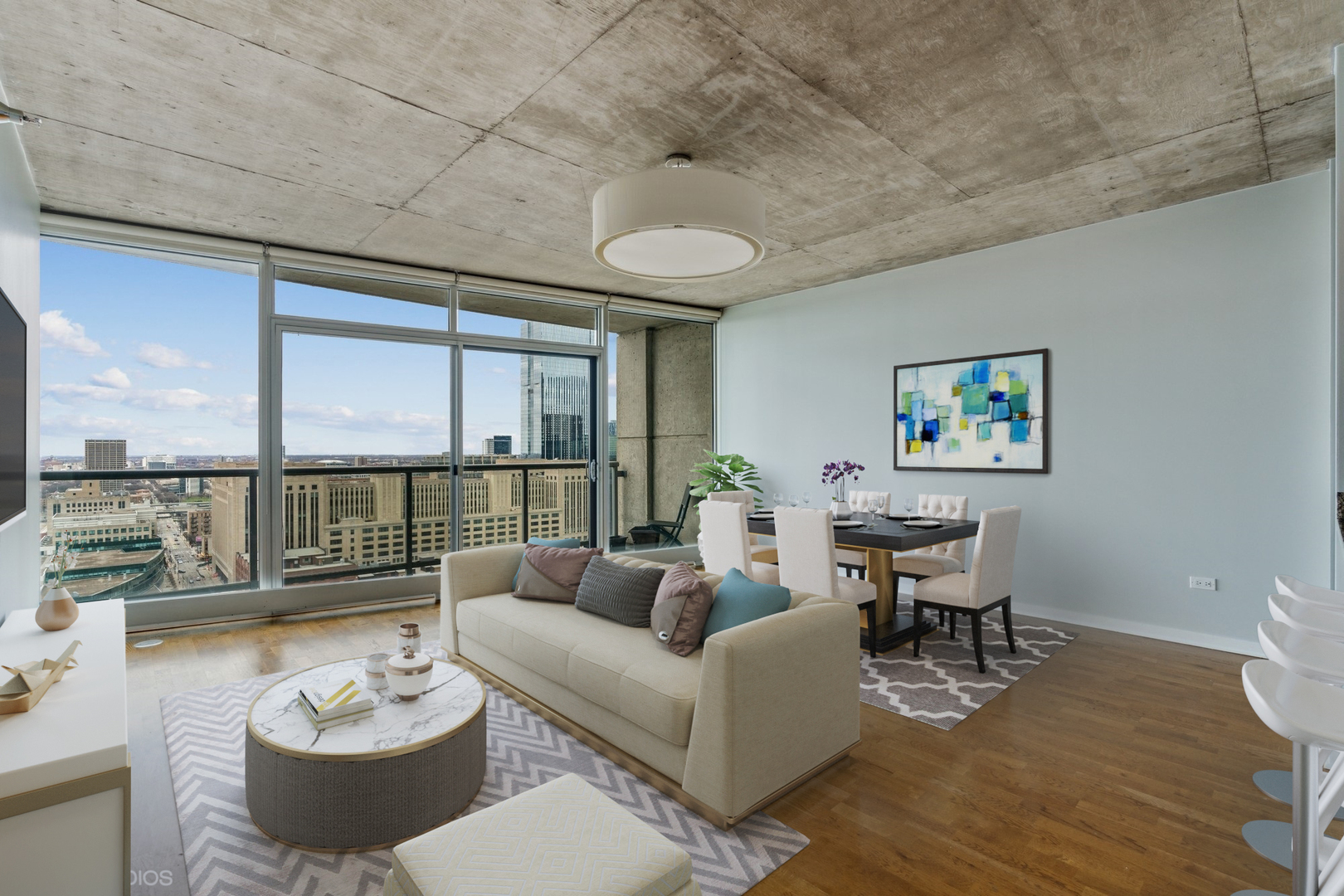 611 South Wells Street, Unit 2705 Chicago, IL 60607 - Photo 2 of 23 a living room with furniture and a floor to ceiling window
