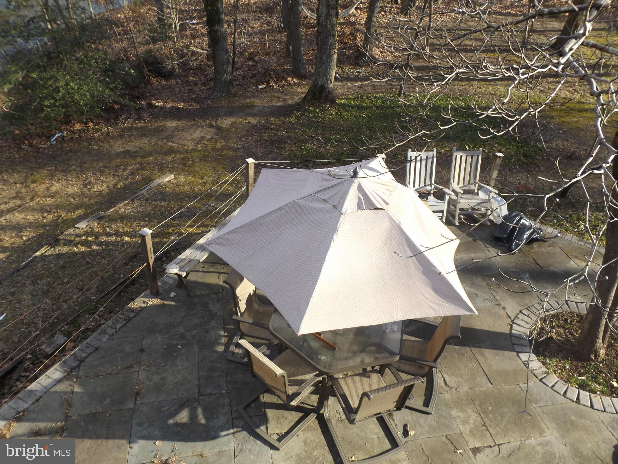 857 Childs Point Road Annapolis, MD 21401 - Photo 14 of 29 front patio with creek view