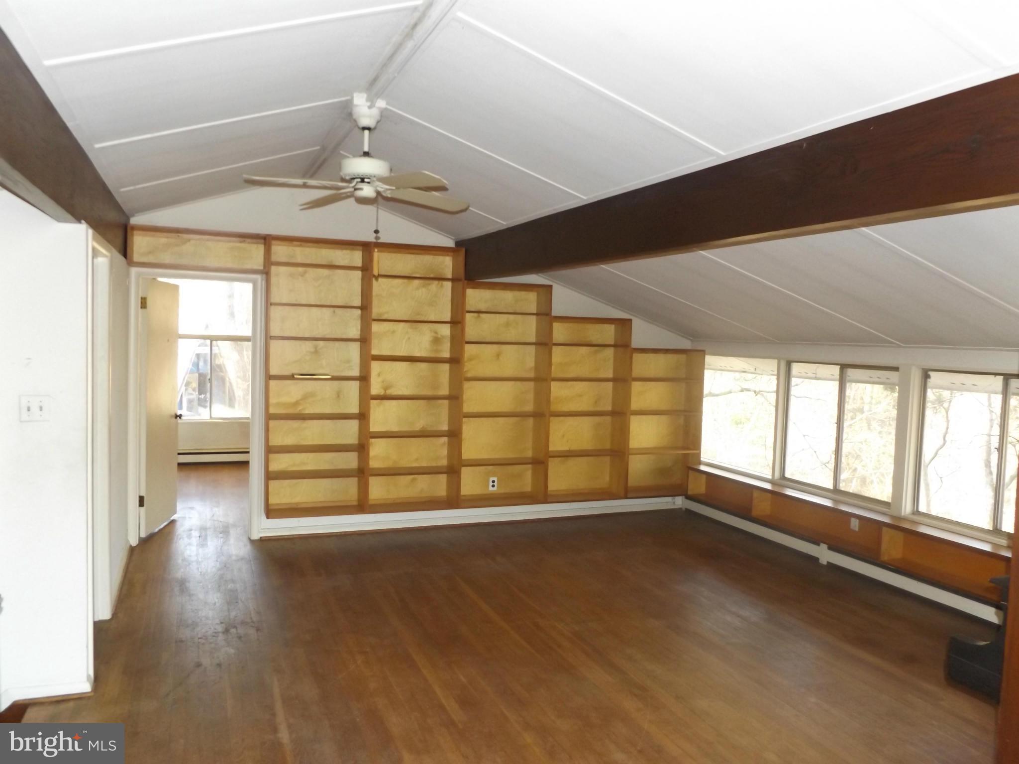 857 Childs Point Road Annapolis, MD 21401 - Photo 15 of 29 living room on upper level