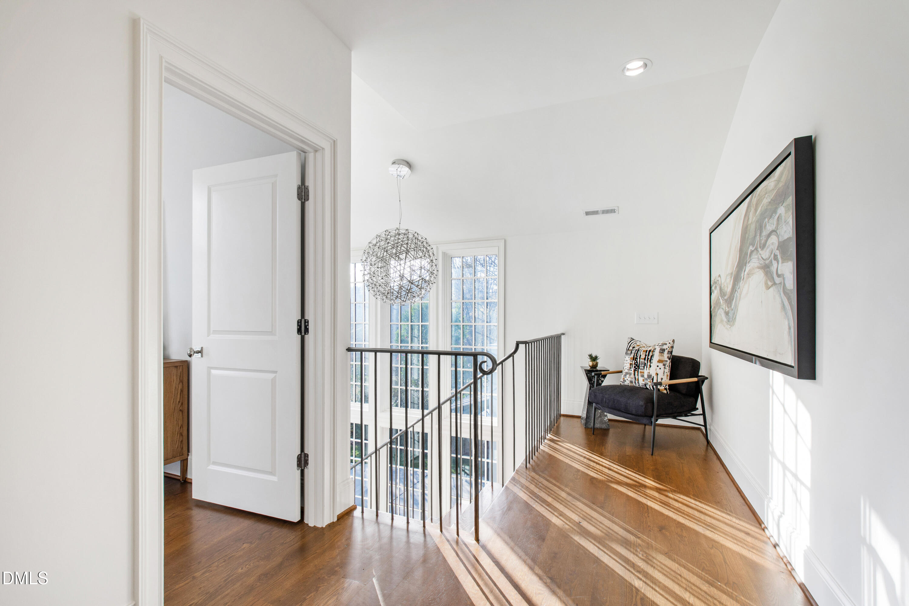 3100 Georgian Terrace Raleigh, NC 27607 - Photo 31 of 74 a view of a room with wooden floor and windows