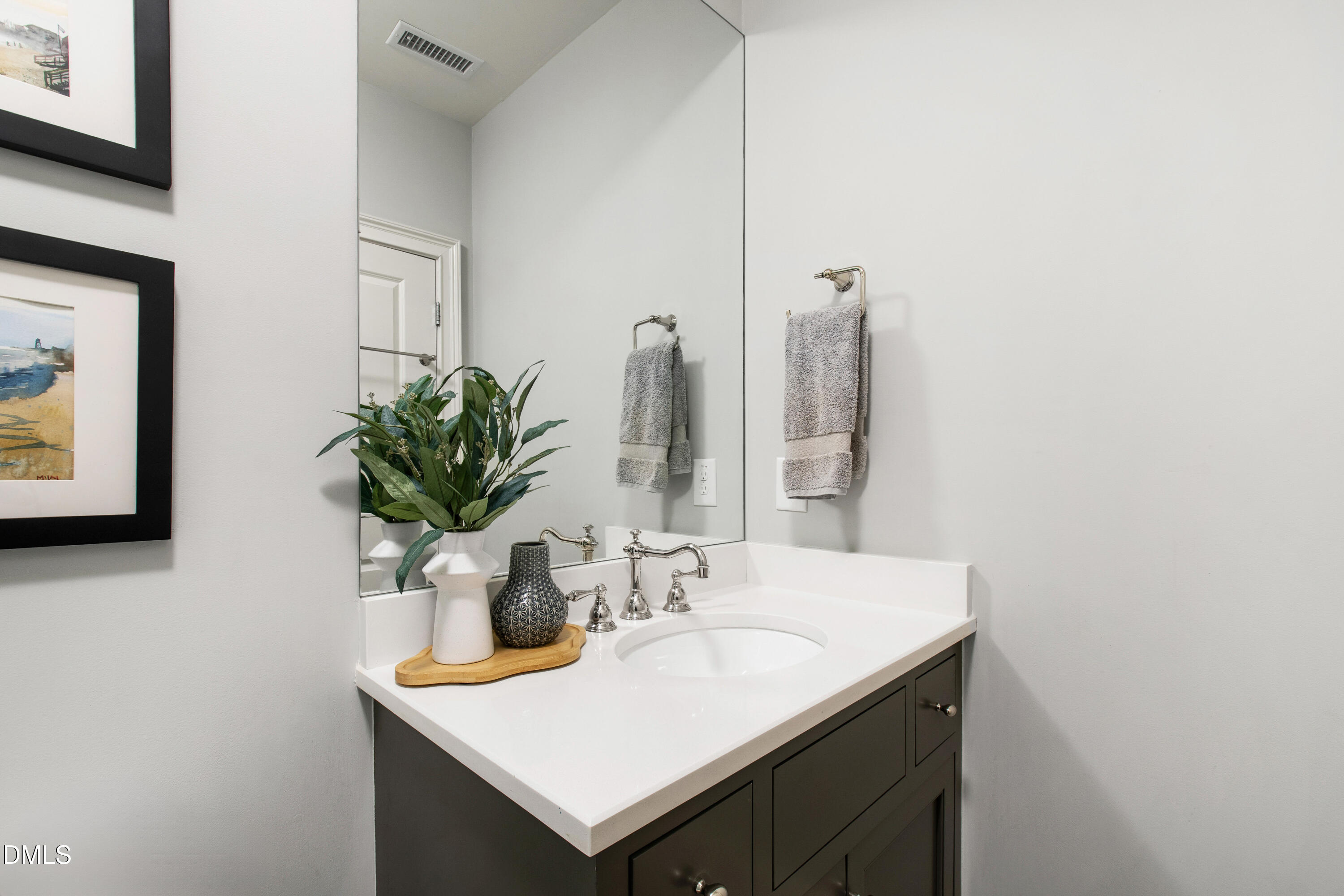 3100 Georgian Terrace Raleigh, NC 27607 - Photo 54 of 74 a bathroom with a sink and a mirror