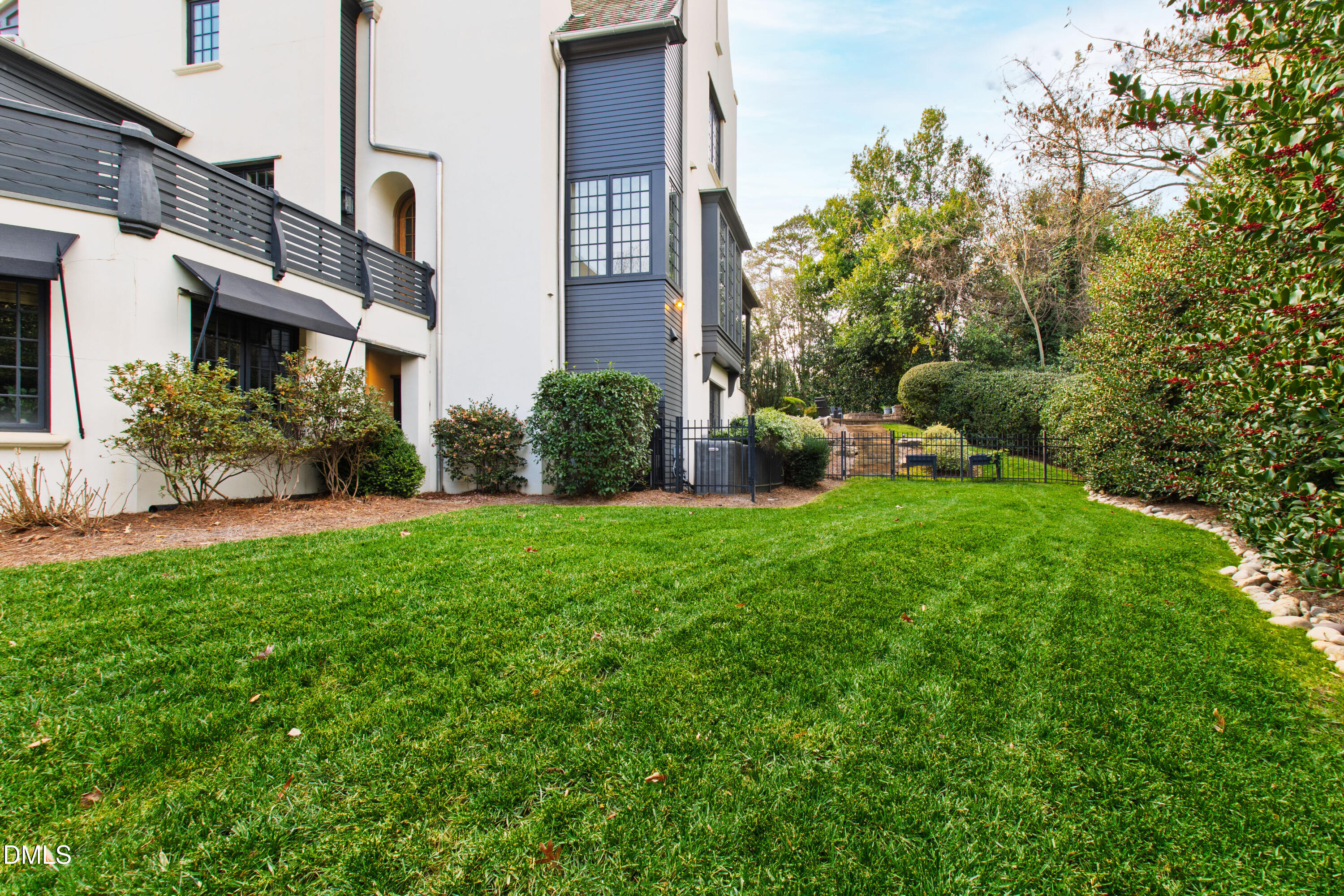 3100 Georgian Terrace Raleigh, NC 27607 - Photo 65 of 74 a view of a house with a yard and garden