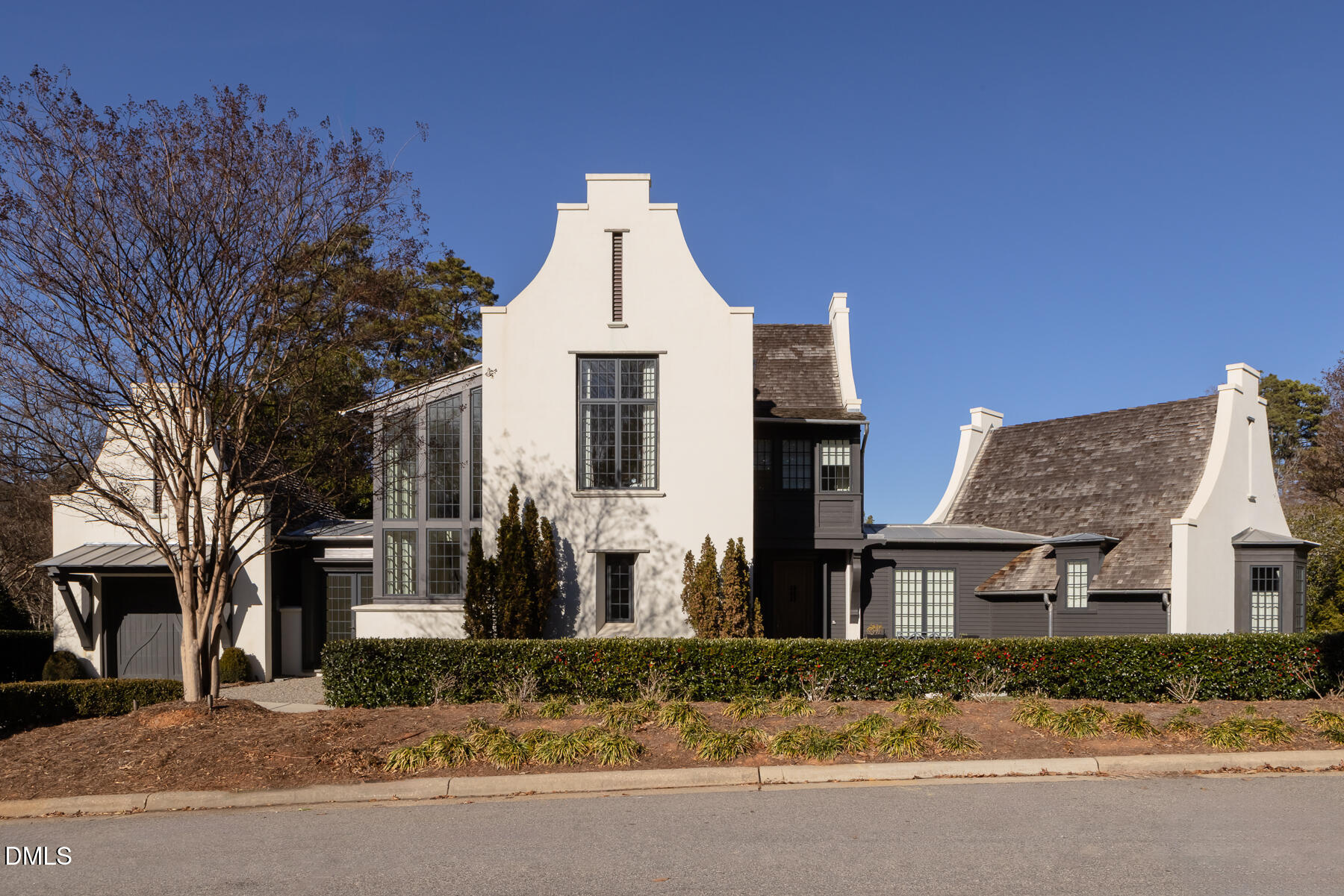 3100 Georgian Terrace Raleigh, NC 27607 - Photo 70 of 74 a view of a white house next to a road and yard