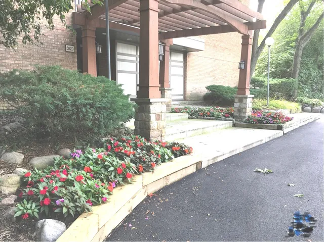 a kitchen with a white cabinets and white appliances