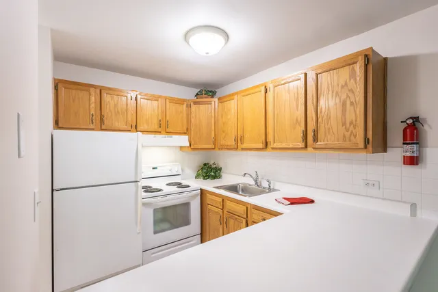 a bedroom with a bed and couch