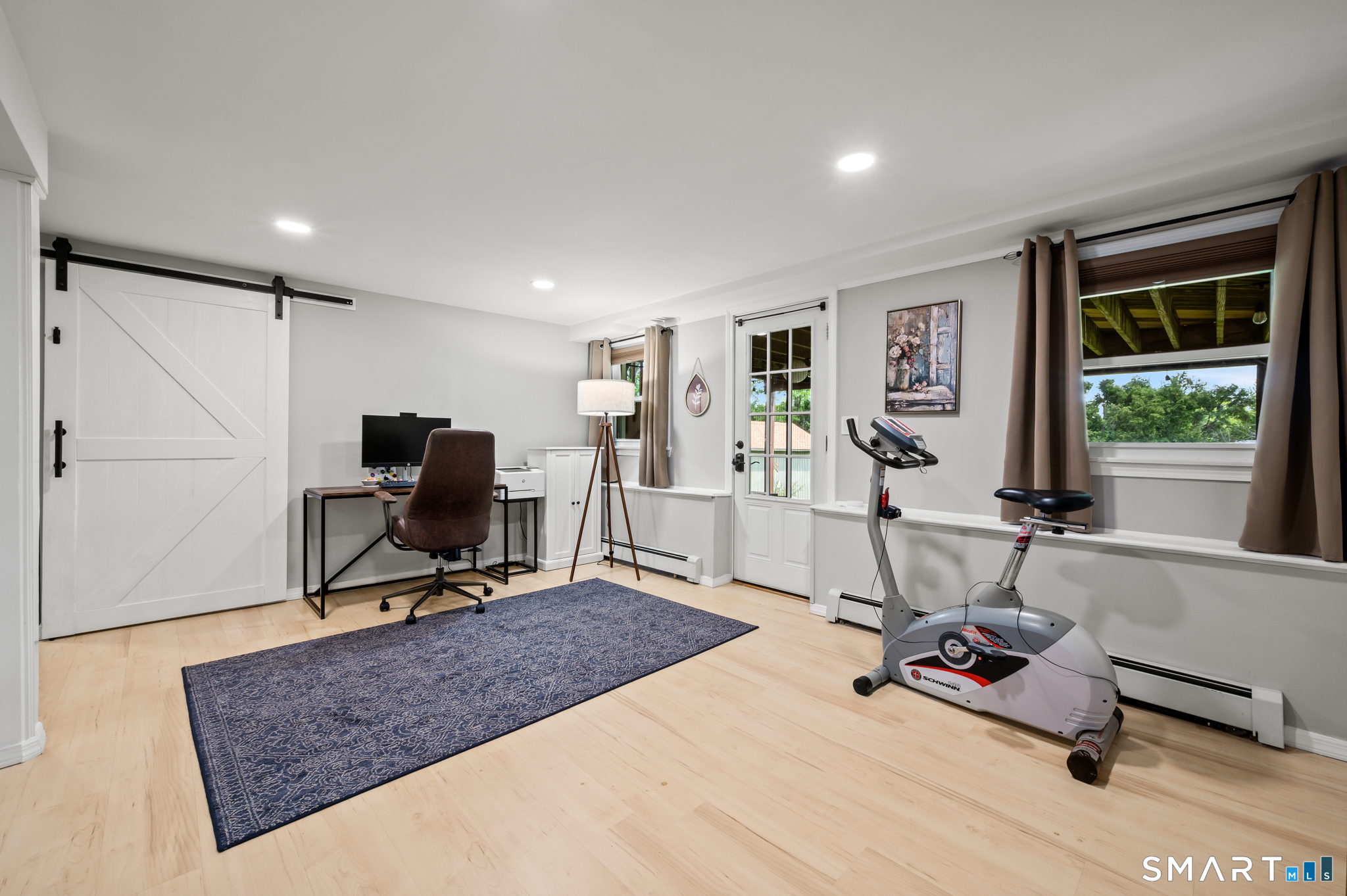 201 Ridge Crest Circle Wethersfield, CT 06109 - Photo 21 of 35 a view of a room with gym equipment and floor to ceiling window
