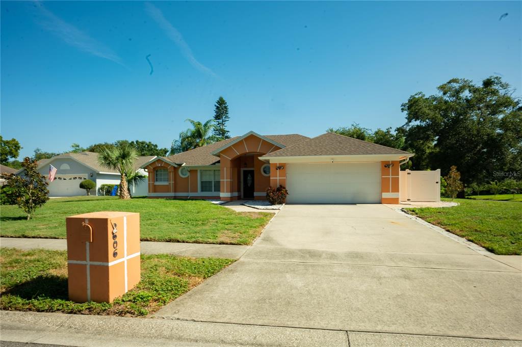 2606 Cedar Bluff Lane Ocoee, FL 34761 - Photo 1 of 1 a front view of a house with a yard