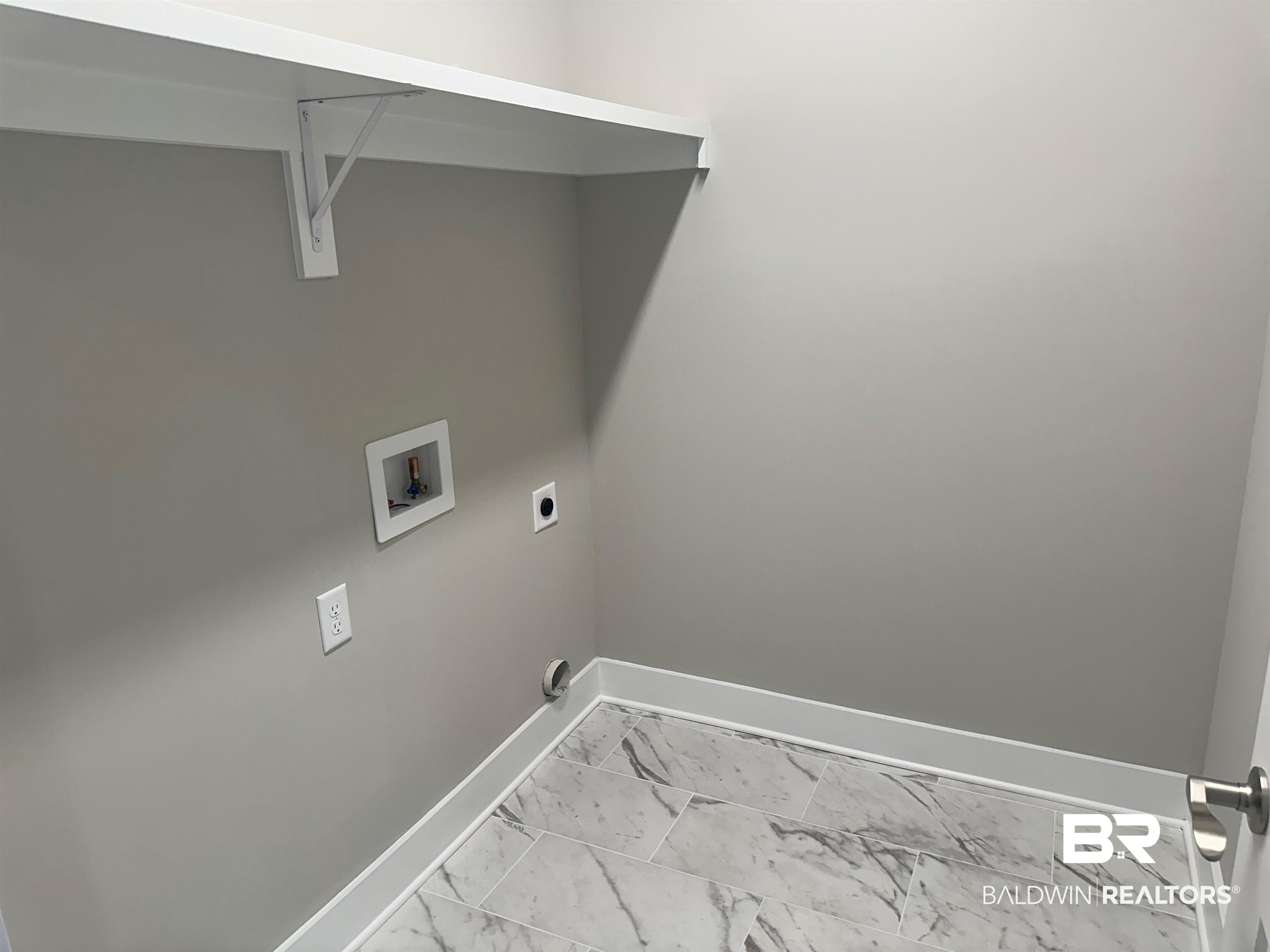 23548 Travis Stock Street, Unit 50 Foley, AL 36535 - Photo 15 of 30 Laundry area featuring washer hookup and hookup for an electric dryer