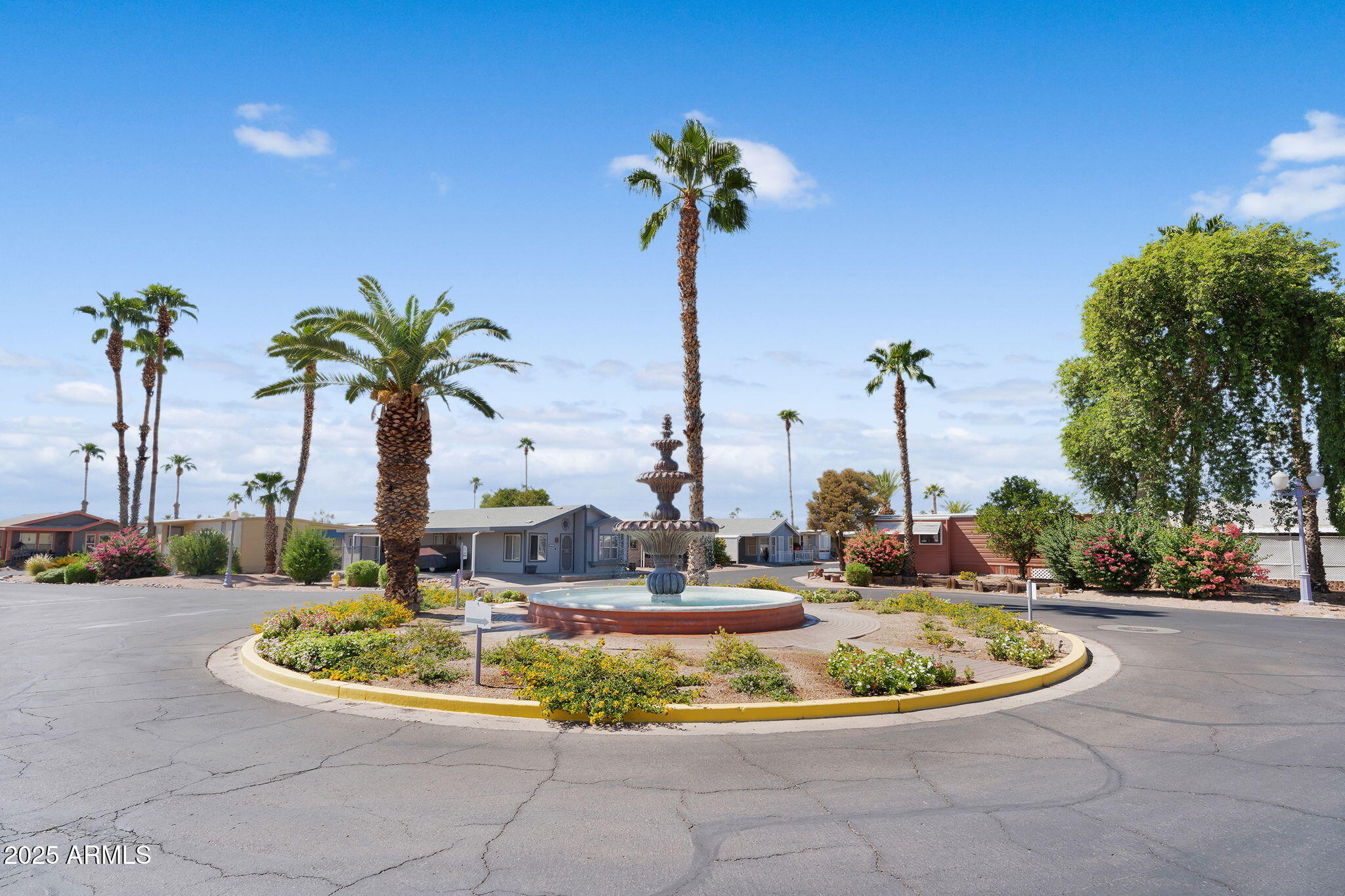 8865 East Baseline Road, Unit 802 Mesa, AZ 85209 - Photo 31 of 44 a view of a swimming pool with a yard