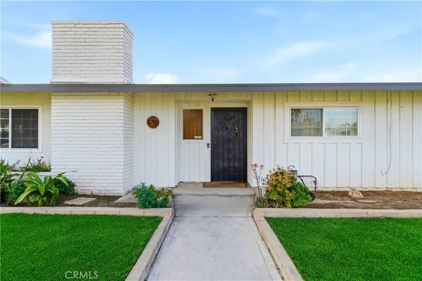 a front view of a house having yard