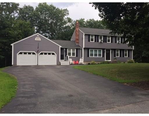 2 Virginia Road Tyngsborough, MA 01879 - Photo 1 of 11 a front view of a house with a yard