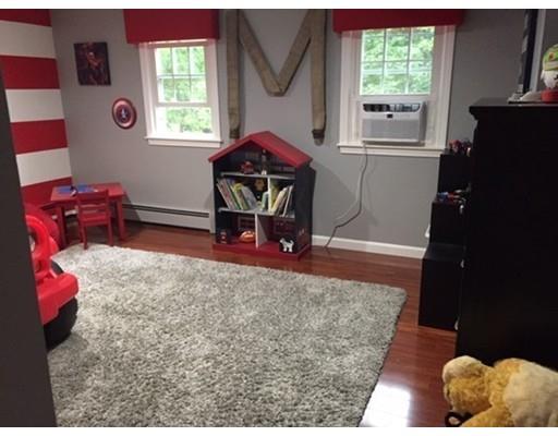 2 Virginia Road Tyngsborough, MA 01879 - Photo 11 of 11 a living room with furniture and a window