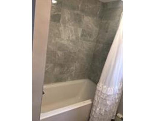 2 Virginia Road Tyngsborough, MA 01879 - Photo 8 of 11 a bathroom with a bathtub