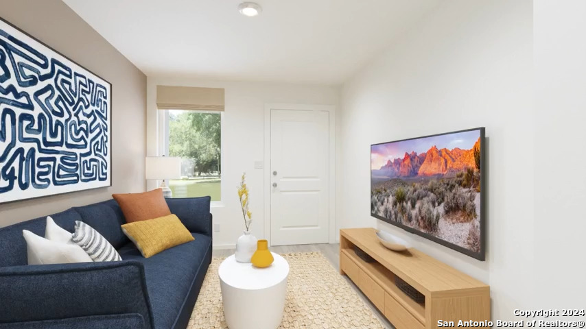 5030 Primrose Ridge Converse, TX 78109 - Photo 4 of 17 a living room with furniture and a flat screen tv