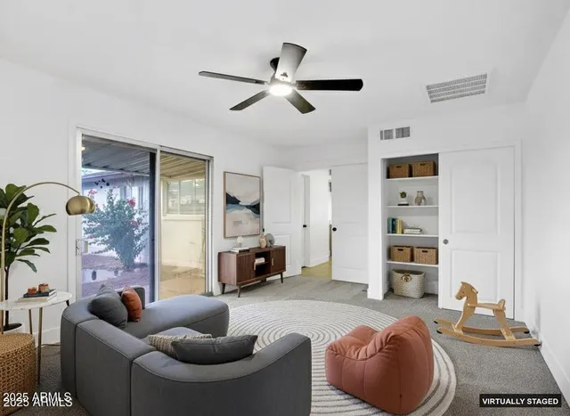 a living room with furniture and a couch