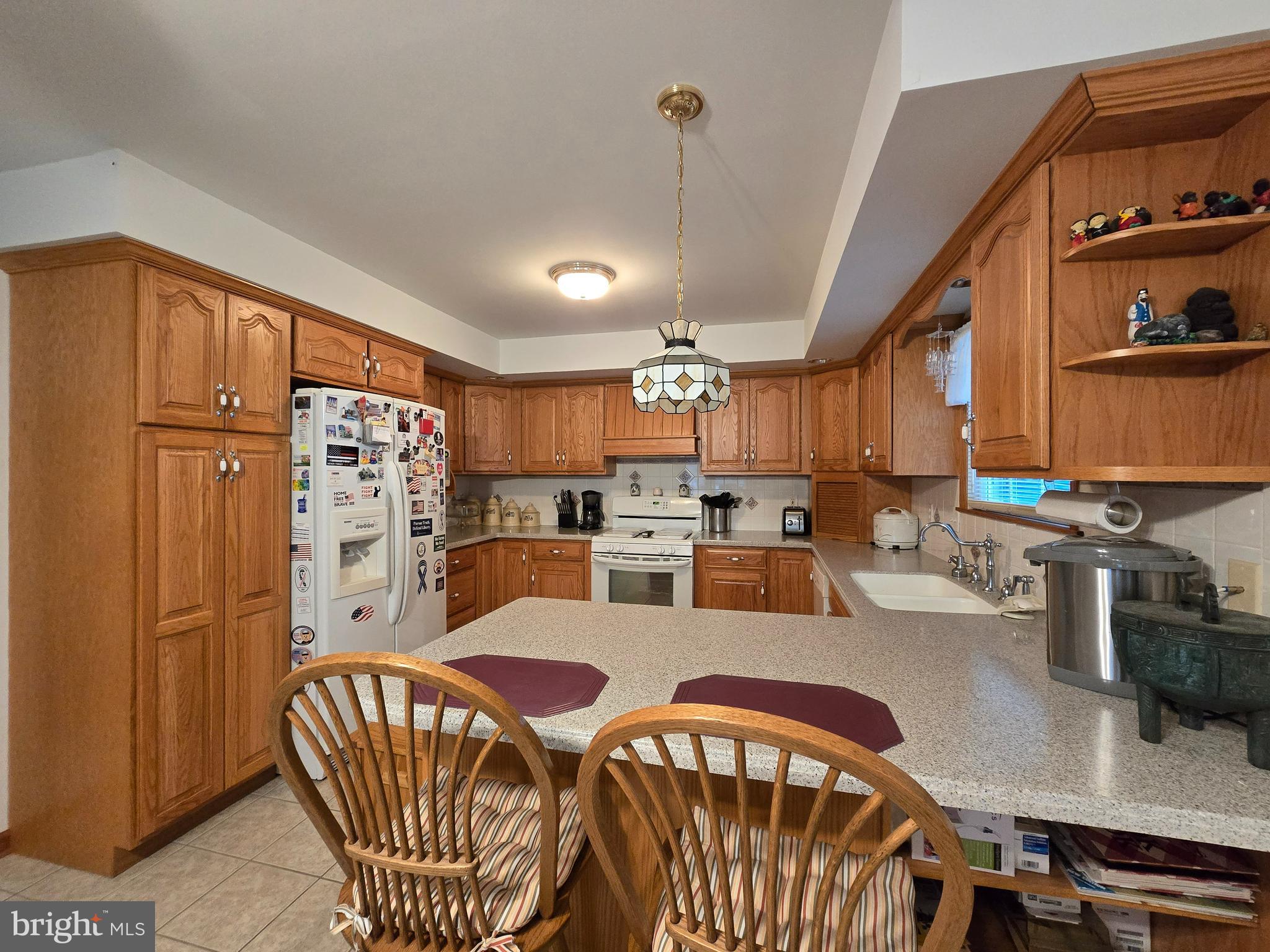 135 Trenton Road Browns Mills, NJ 08015 - Photo 16 of 49 a view of kitchen with dining table and chairs