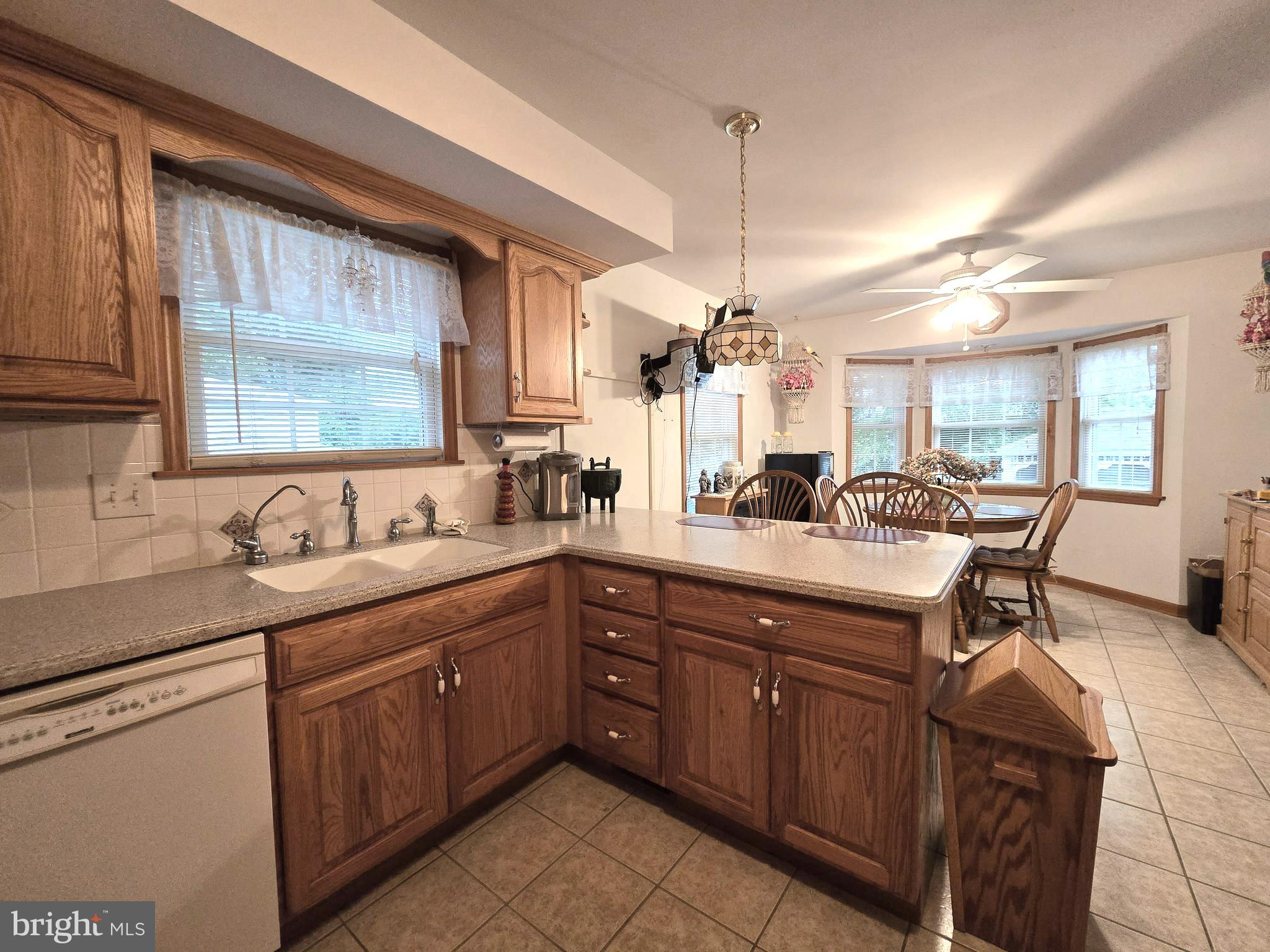 135 Trenton Road Browns Mills, NJ 08015 - Photo 17 of 49 a kitchen with sink and view of living room