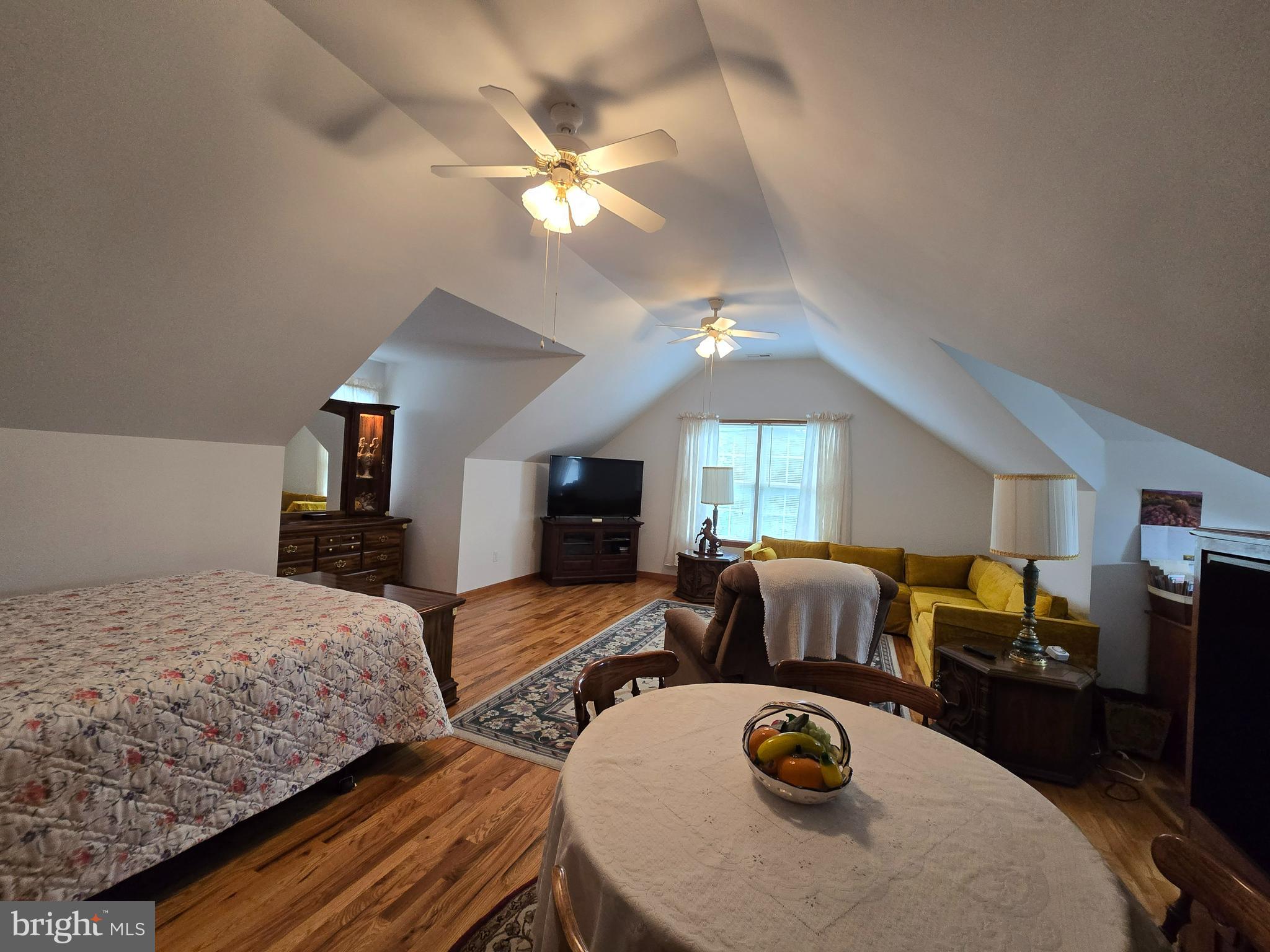 135 Trenton Road Browns Mills, NJ 08015 - Photo 29 of 49 a bedroom with a bed and ceiling fan