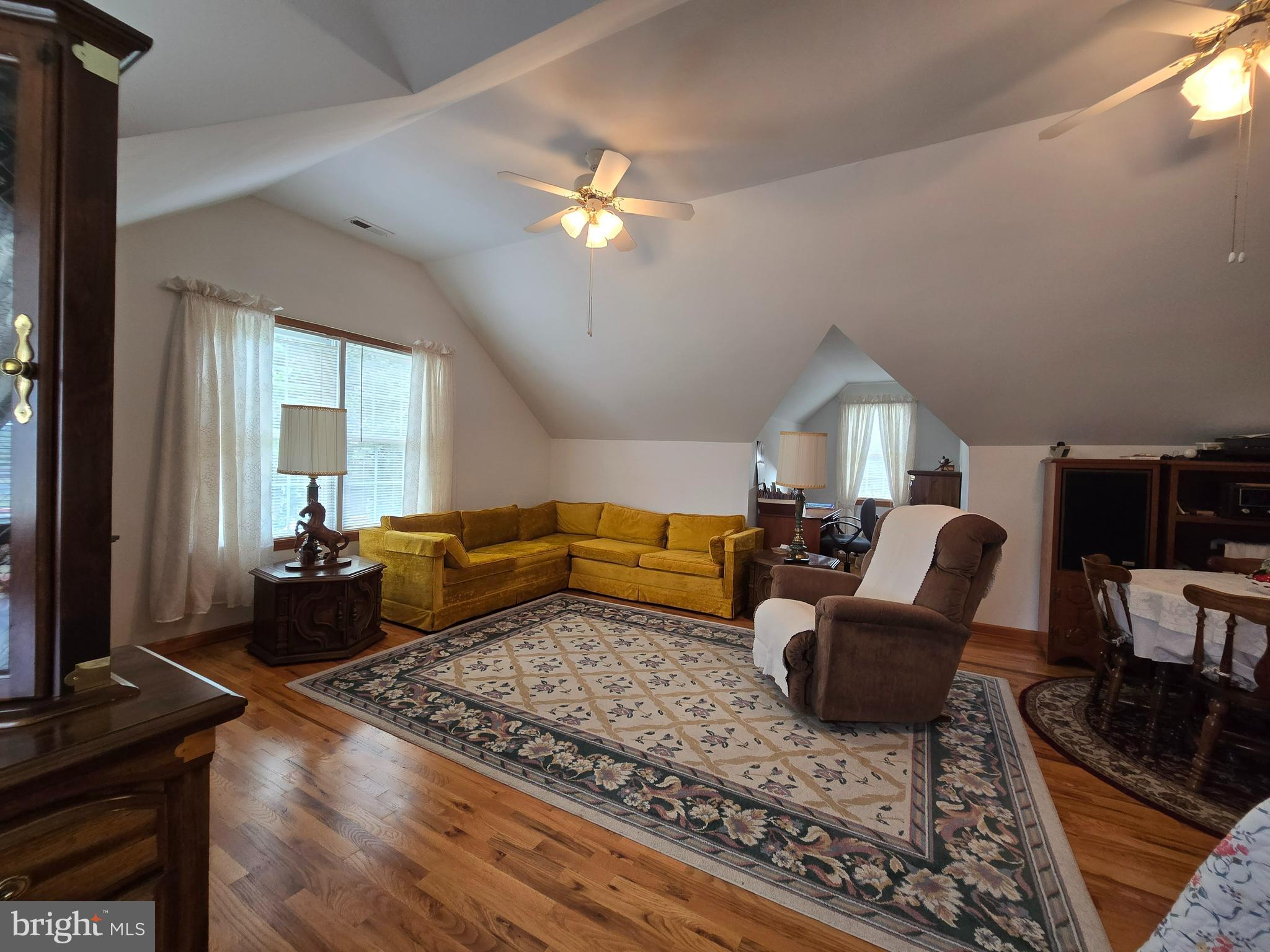 135 Trenton Road Browns Mills, NJ 08015 - Photo 31 of 49 a living room with furniture ceiling fan and a rug