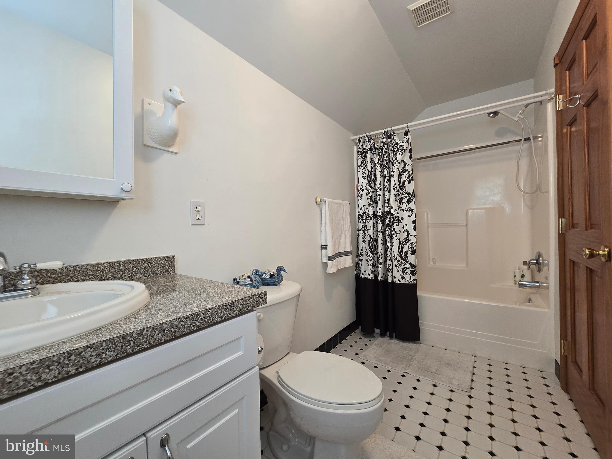 135 Trenton Road Browns Mills, NJ 08015 - Photo 38 of 49 a bathroom with a granite countertop sink toilet and shower