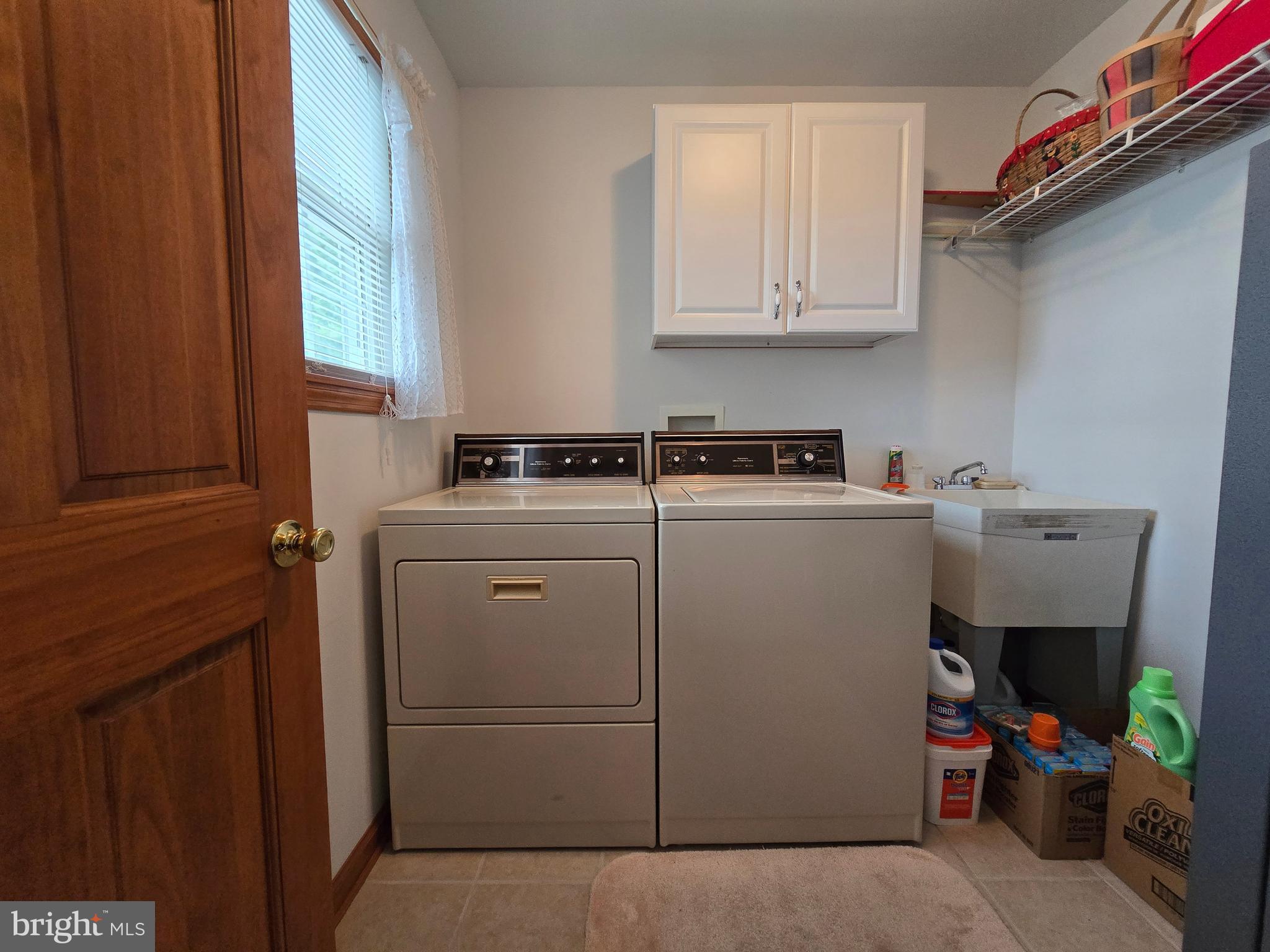 135 Trenton Road Browns Mills, NJ 08015 - Photo 42 of 49 a utility room with dryer washer and a window