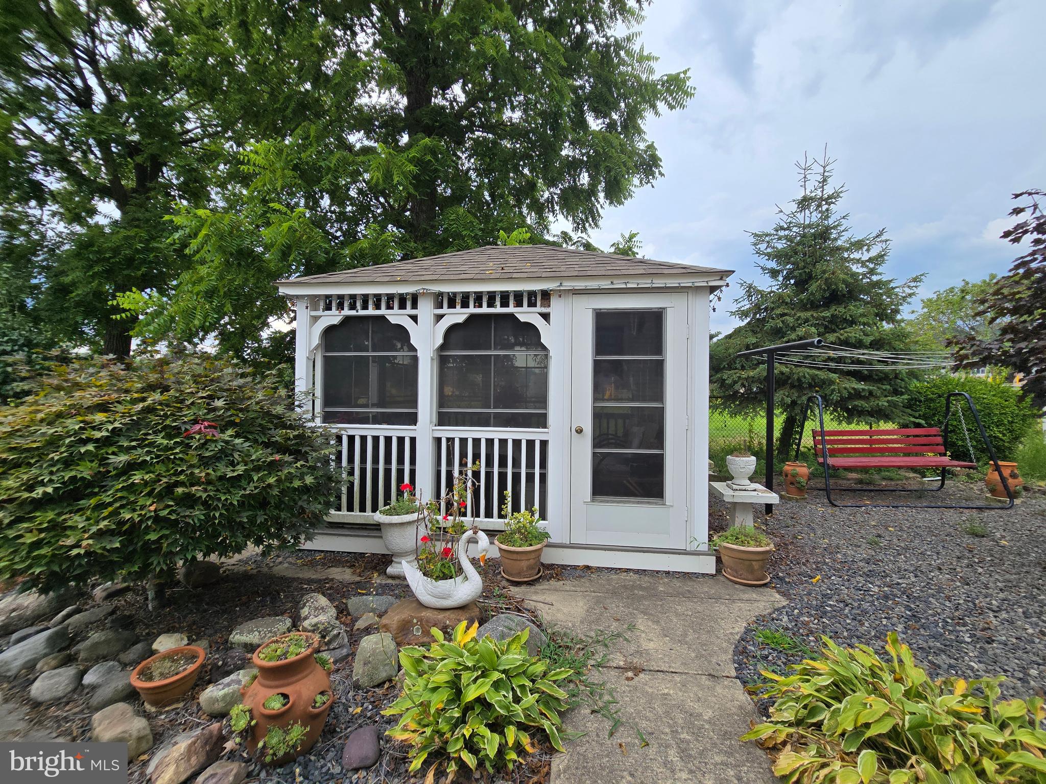 135 Trenton Road Browns Mills, NJ 08015 - Photo 6 of 49 a front view of a house with garden