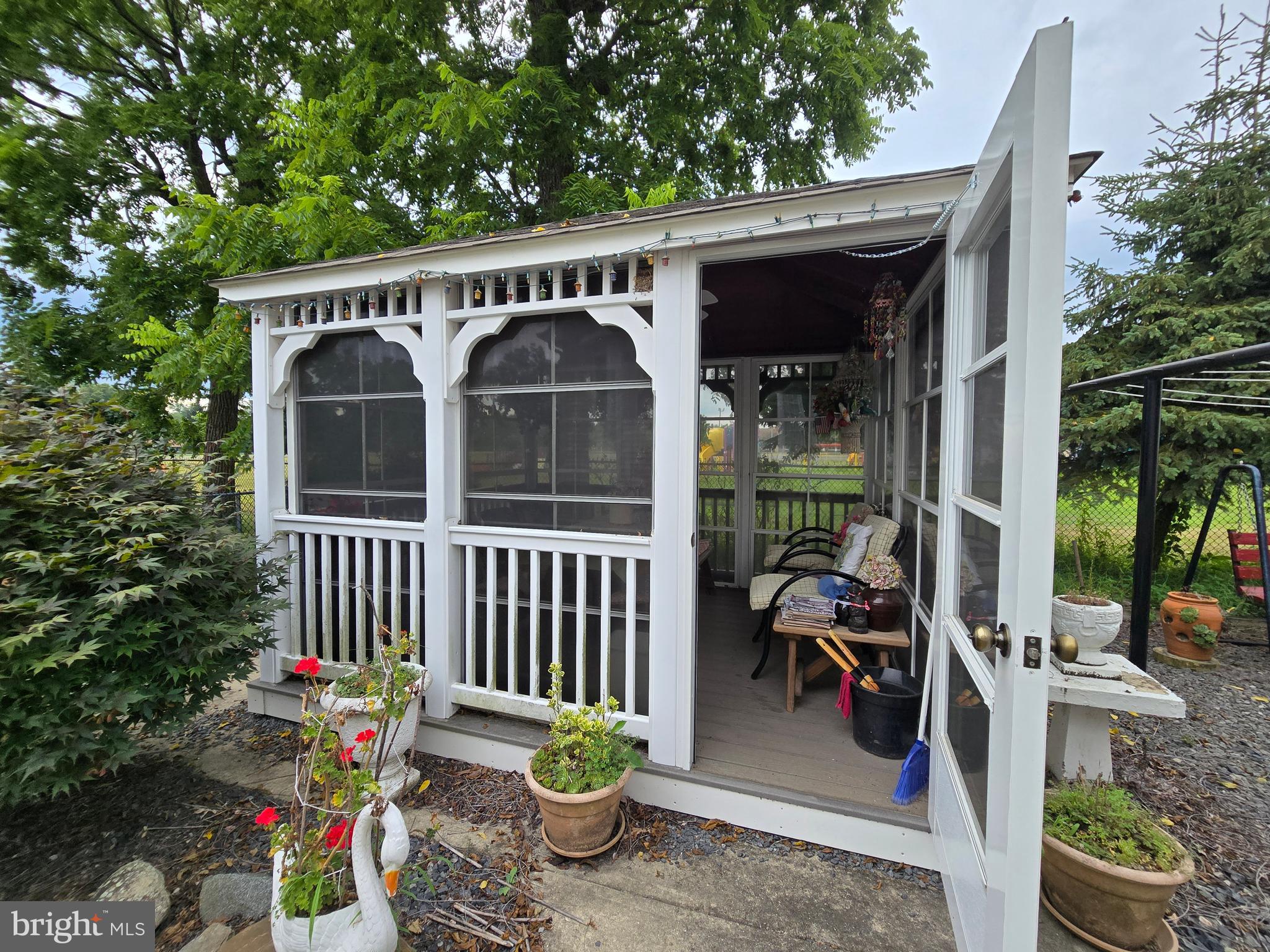 135 Trenton Road Browns Mills, NJ 08015 - Photo 7 of 49 a view of a chair and tables in the balcony
