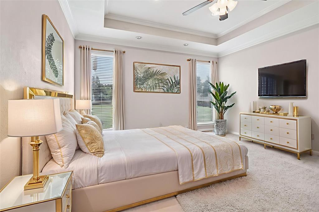 120 Waldrum Road Combine, TX 75159 - Photo 16 of 35 a bedroom with a bed and a flat screen tv