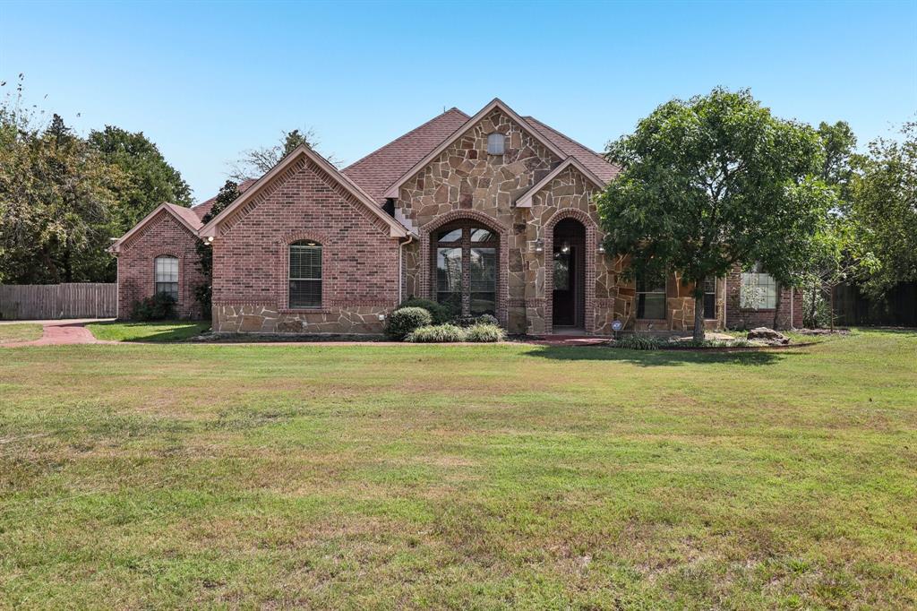 120 Waldrum Road Combine, TX 75159 - Photo 2 of 35 a front view of house with yard and green space