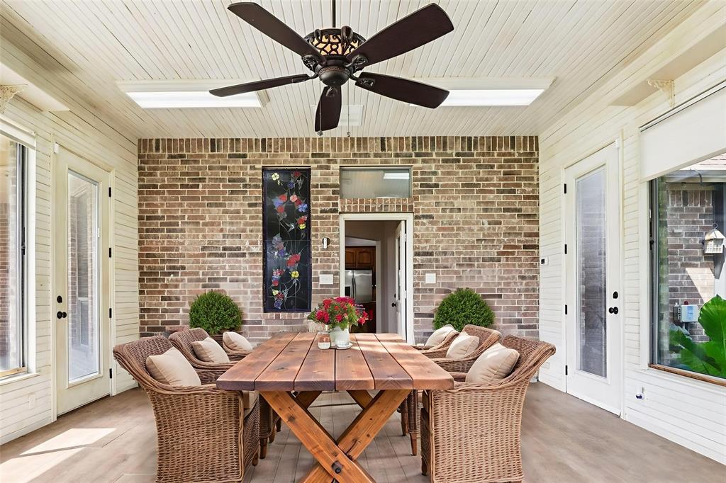 120 Waldrum Road Combine, TX 75159 - Photo 22 of 35 a view of a patio with a table and chairs