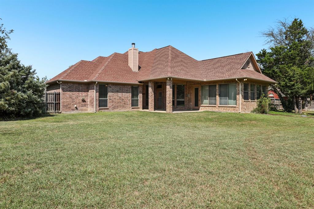 120 Waldrum Road Combine, TX 75159 - Photo 26 of 35 a front view of a house with garden