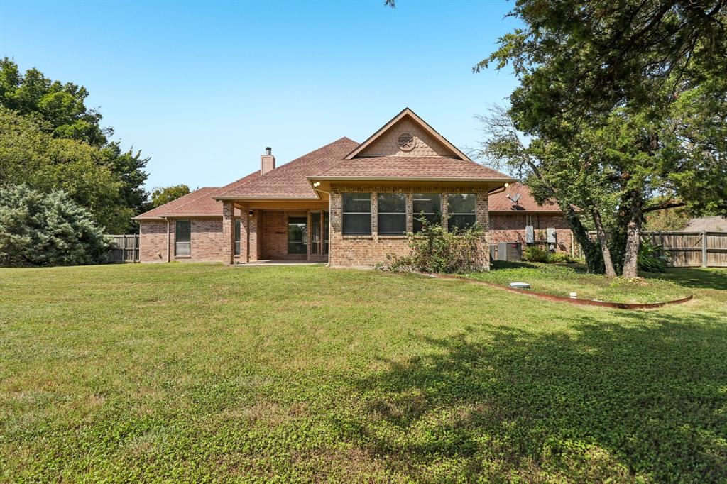 120 Waldrum Road Combine, TX 75159 - Photo 27 of 35 a front view of a house with garden