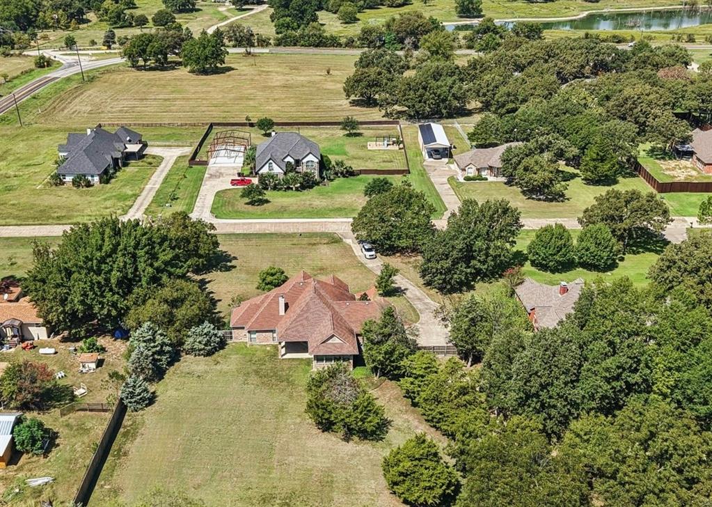 120 Waldrum Road Combine, TX 75159 - Photo 33 of 35 an aerial view of a house with a lake view