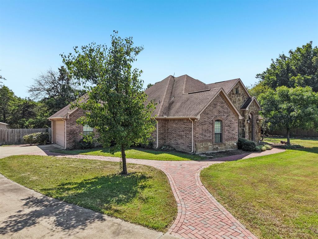 120 Waldrum Road Combine, TX 75159 - Photo 34 of 35 a front view of a house with a yard