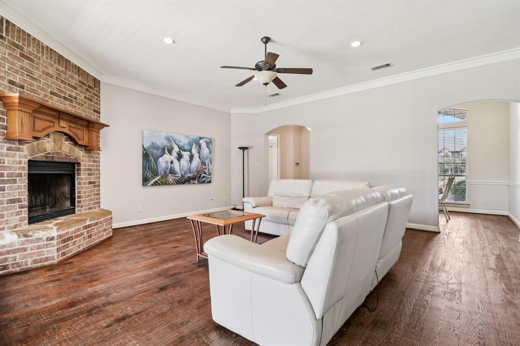 120 Waldrum Road Combine, TX 75159 - Photo 7 of 35 a living room with furniture and a fireplace