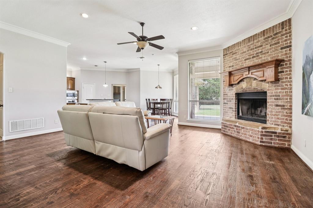 120 Waldrum Road Combine, TX 75159 - Photo 8 of 35 a living room with furniture and a fireplace