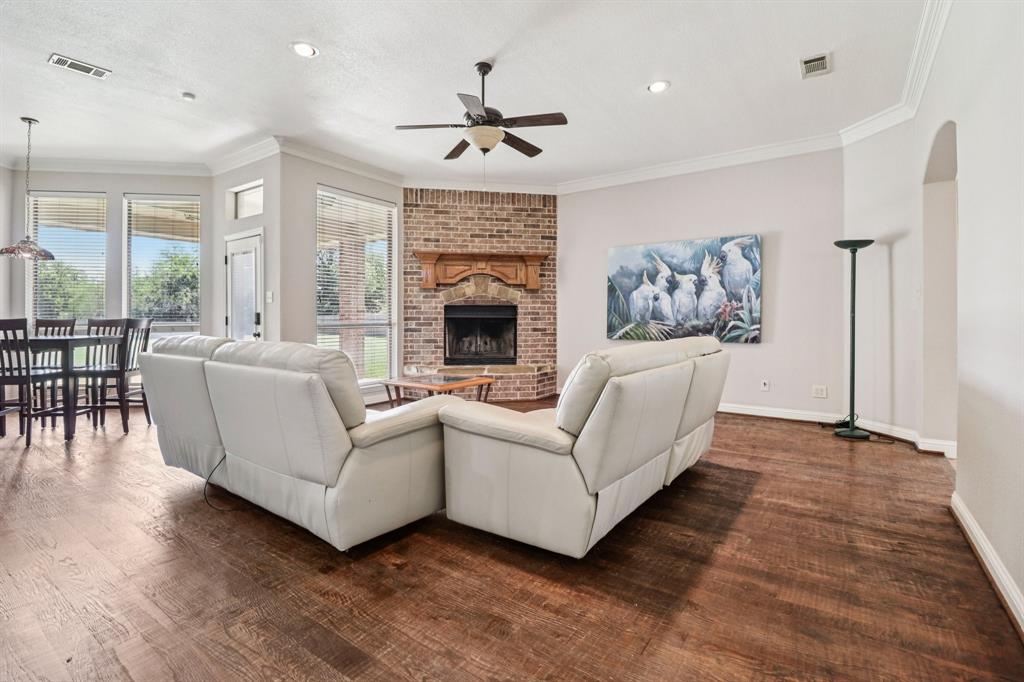 120 Waldrum Road Combine, TX 75159 - Photo 10 of 35 a living room with furniture and a fireplace