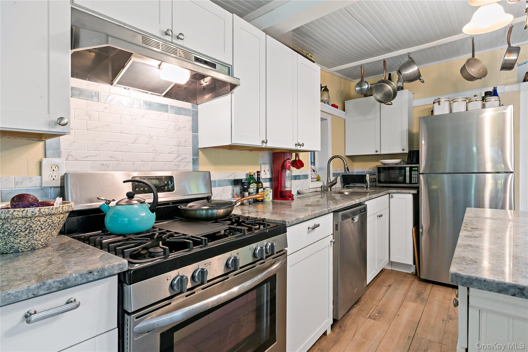 Kitchen showing stainless steel appliances