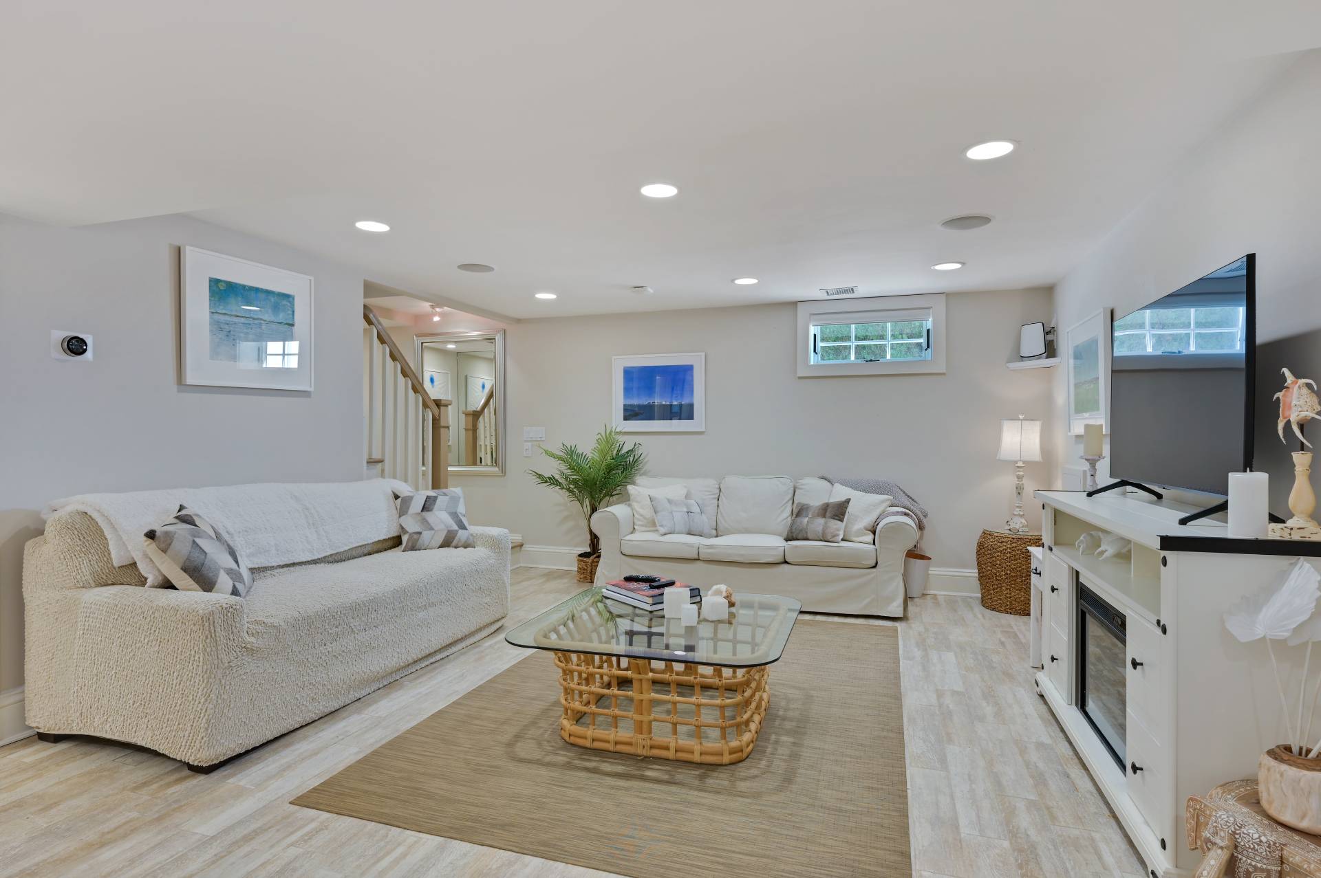 5 Ridge Drive Sag Harbor, NY 11963 - Photo 13 of 27 a living room with furniture and a flat screen tv