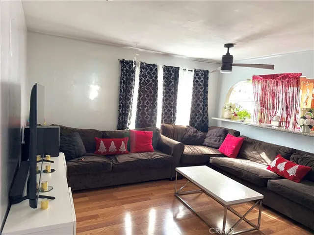 a kitchen with stainless steel appliances granite countertop a stove a sink dishwasher and a refrigerator