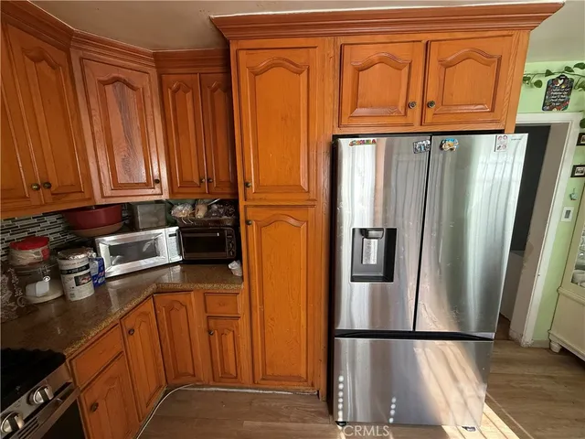 a view of a dining room with furniture window and entryway