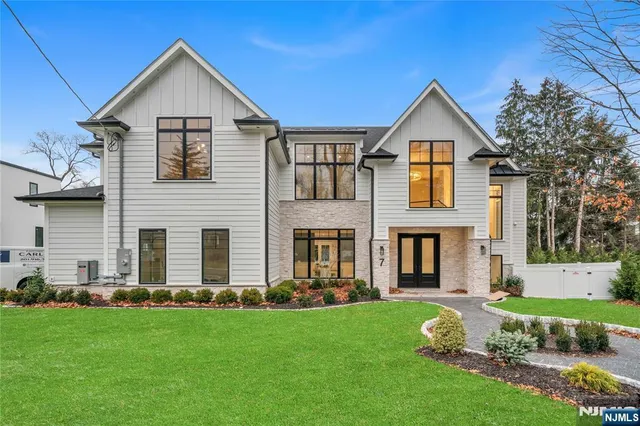 a spacious bedroom with a large bed and a window