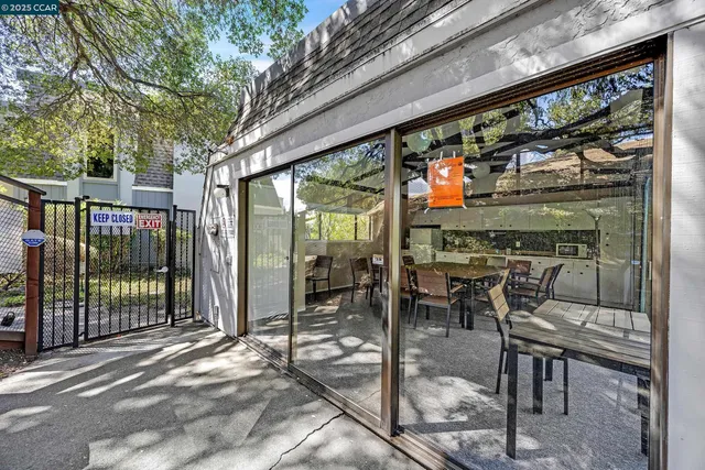 a living room with a couch and a rug