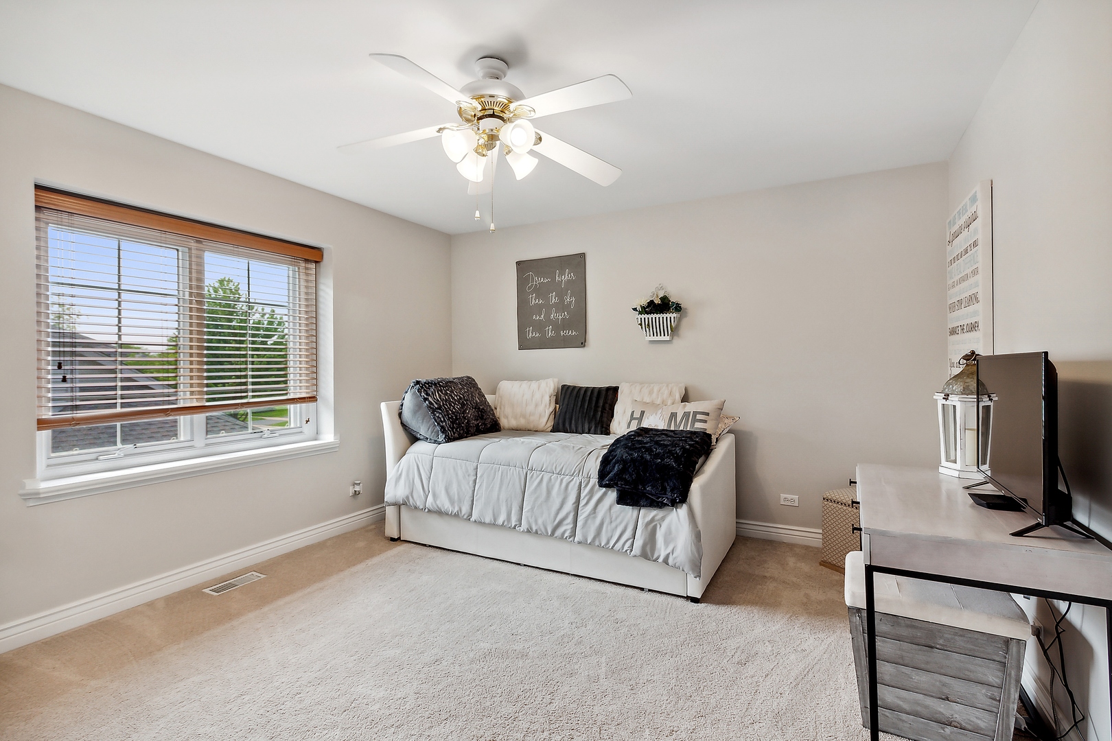 2252 Joyce Lane Naperville, IL 60564 - Photo 17 of 33 a living room with furniture and a flat screen tv