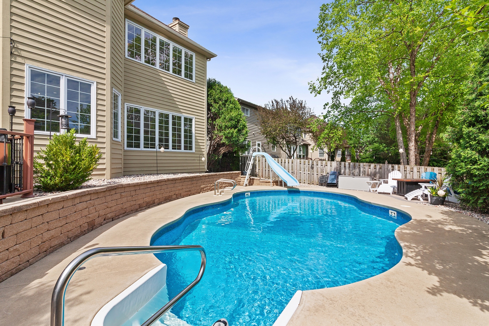 2252 Joyce Lane Naperville, IL 60564 - Photo 28 of 33 a swimming pool with outdoor seating and yard
